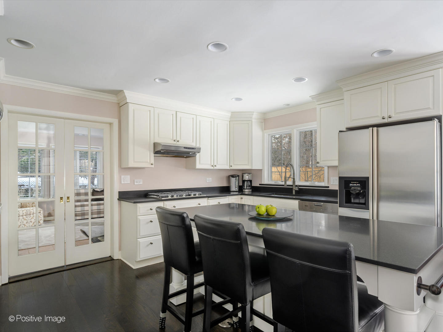 2775 Sheridan Road Evanston, IL 60201 - Photo 12 of 27 a kitchen with a center island appliances and cabinets