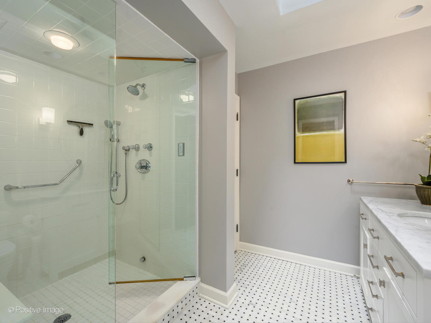 2775 Sheridan Road Evanston, IL 60201 - Photo 18 of 27 a bathroom with a granite countertop shower