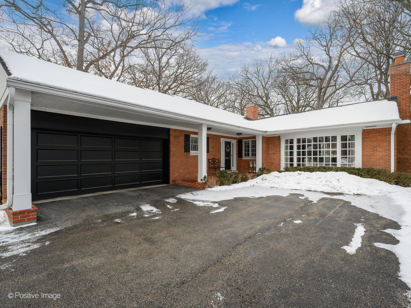 2775 Sheridan Road Evanston, IL 60201 - Photo 2 of 27 a view of a house with a yard and garage