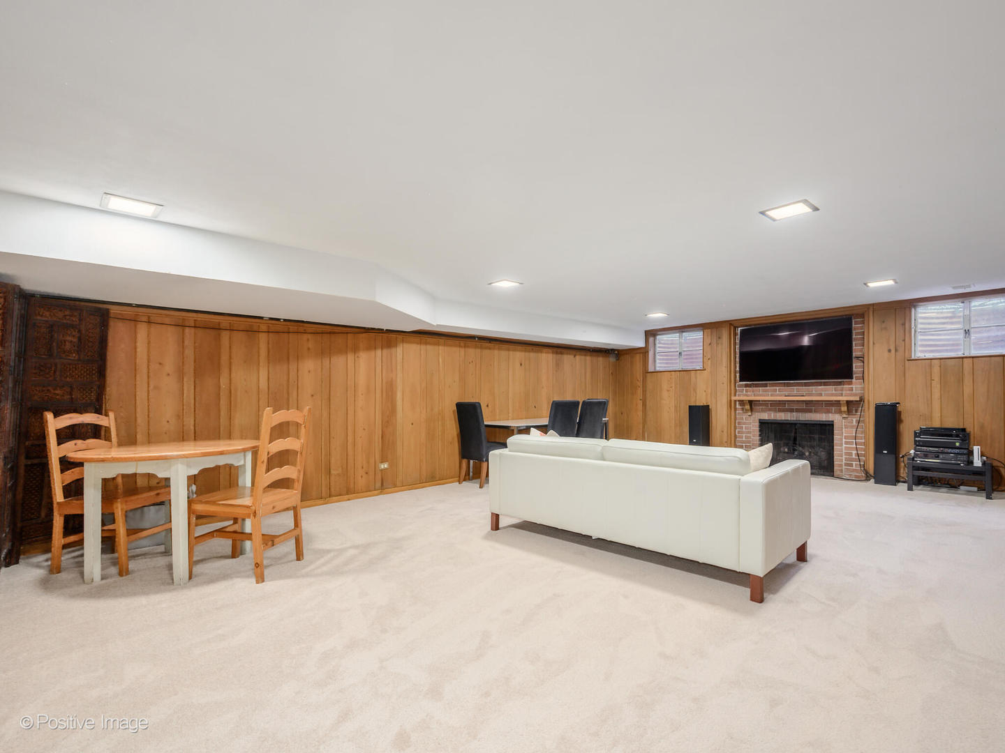 2775 Sheridan Road Evanston, IL 60201 - Photo 22 of 27 a living room with furniture a table and chairs