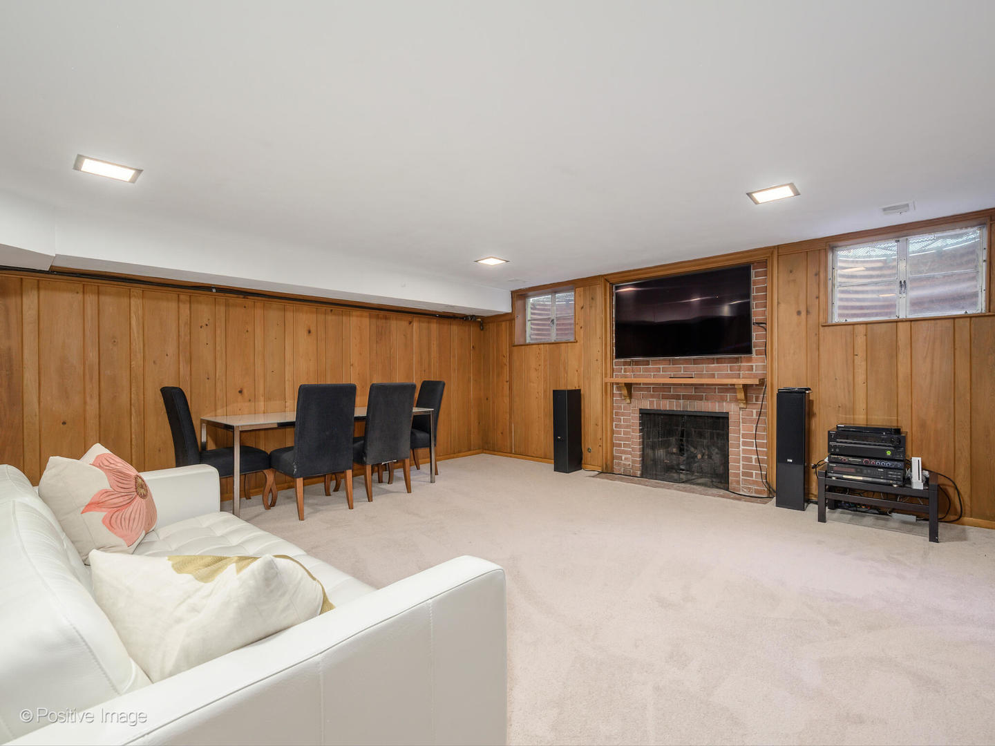 2775 Sheridan Road Evanston, IL 60201 - Photo 23 of 27 a living room with furniture and a fireplace