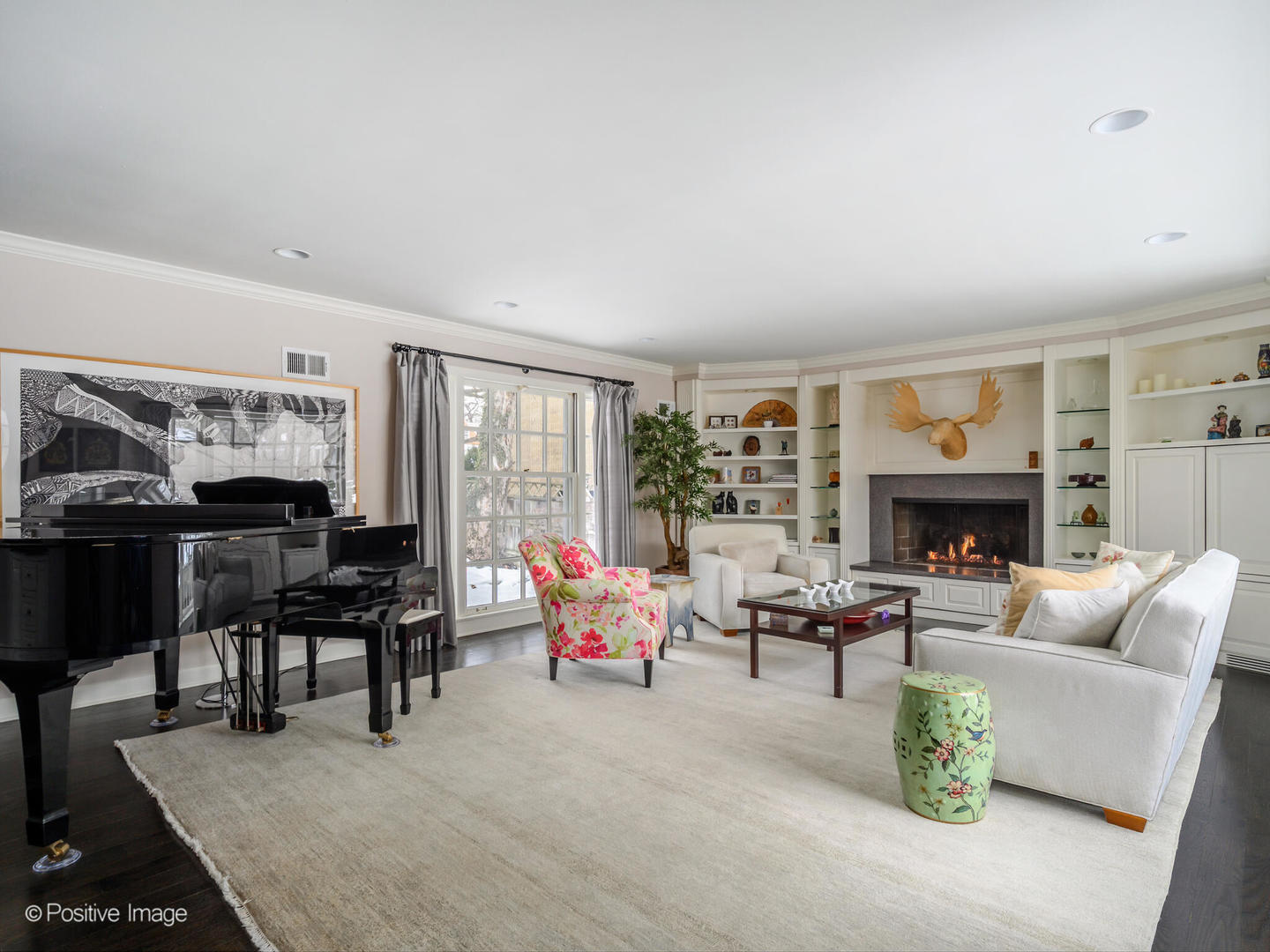 2775 Sheridan Road Evanston, IL 60201 - Photo 5 of 27 a living room with furniture and a fireplace