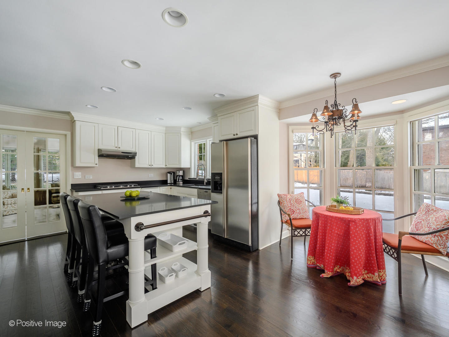 2775 Sheridan Road Evanston, IL 60201 - Photo 10 of 27 a kitchen that has a table chairs and wooden floor