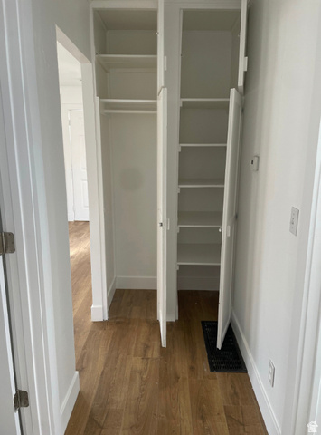 230 North 2nd Street Tooele, UT 84074 - Photo 12 of 18 Built-in hallway storage featuring a hanging rod and adjustable shelving