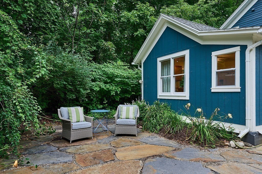 54 Audubon Road Northampton, MA 01053 - Photo 27 of 35 a front view of a house with a garden