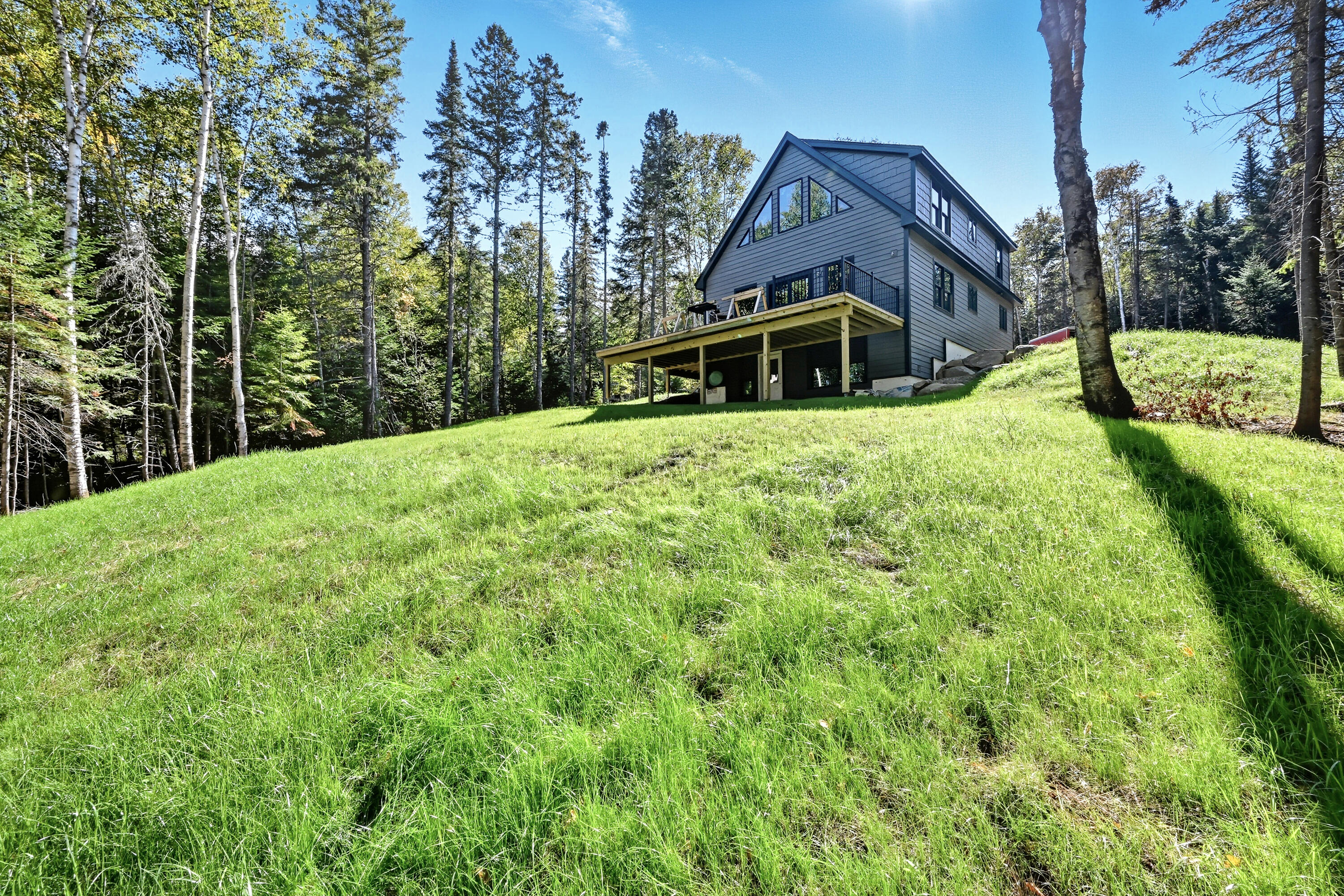 170 The Loop Road Rangeley, ME 04970 - Photo 1 of 57 front lawn