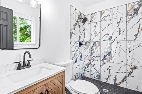 a bathroom with a sink and a toilet