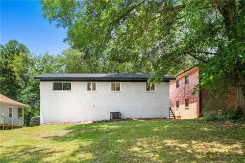a house view with a garden space