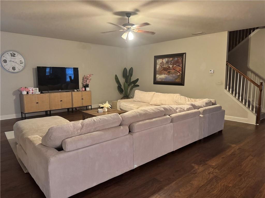 114 Crescent Woode Way Dallas, GA 30157 - Photo 12 of 25 a bedroom with furniture and a flat screen tv