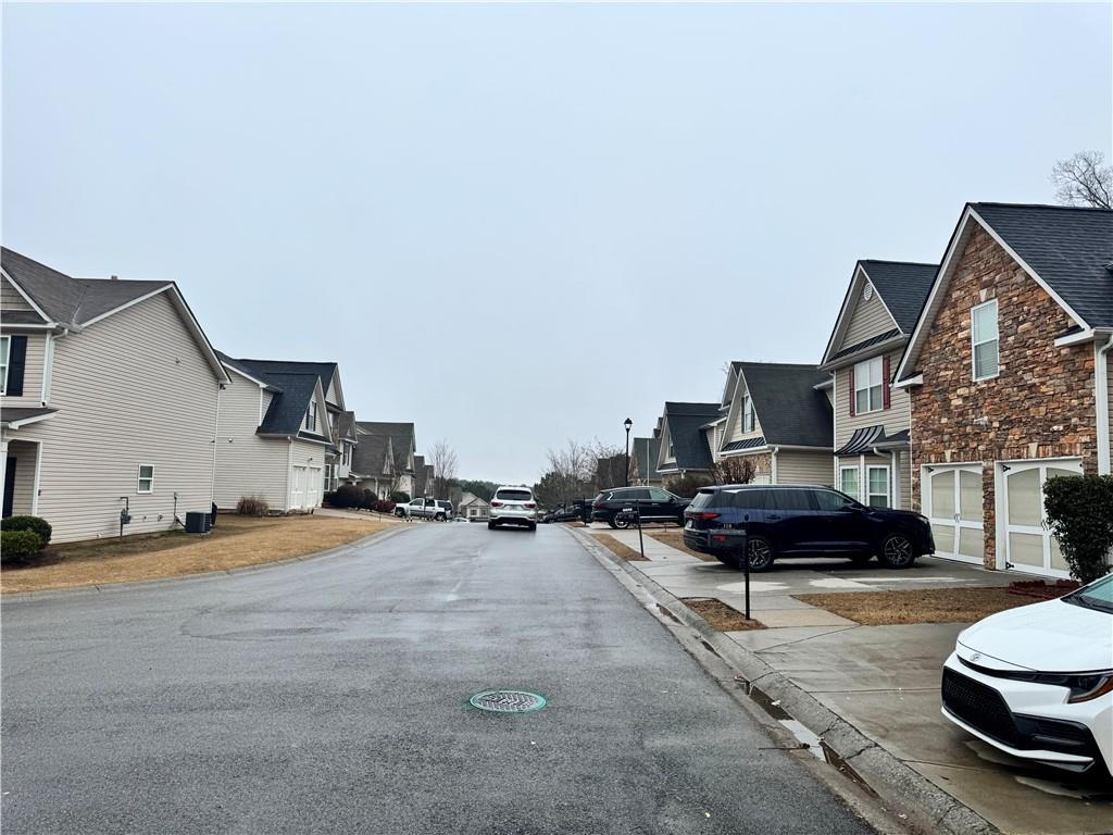 114 Crescent Woode Way Dallas, GA 30157 - Photo 5 of 25 a car parked in front of house