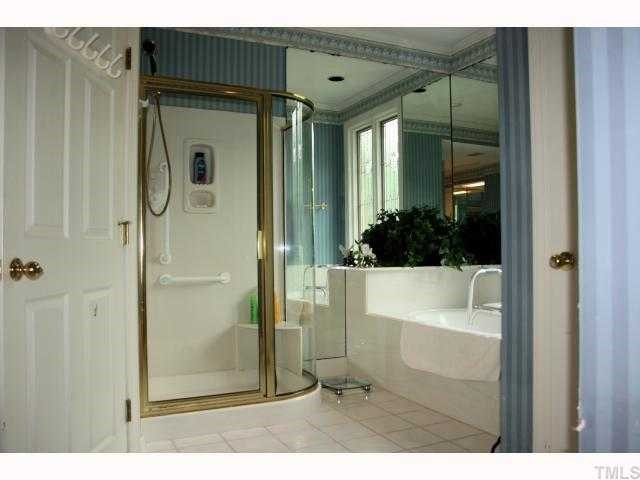 105 Cedar Ridge Way Durham, NC 27705 - Photo 7 of 12 Master bath with 2 walk-in closets, separate vanities and linen closet
