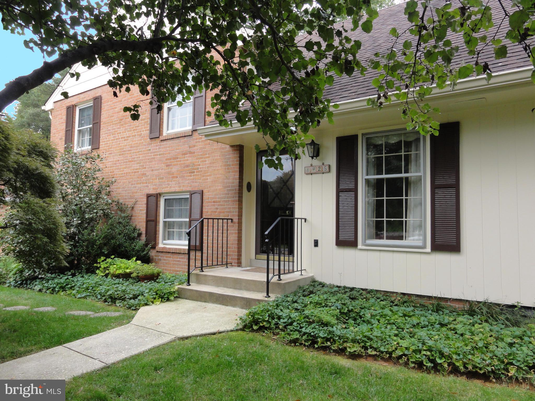 8425 Riverside Road Alexandria, VA 22308 - Photo 1 of 28 front view of a house with a yard