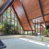 a house view with a sitting space and garden view