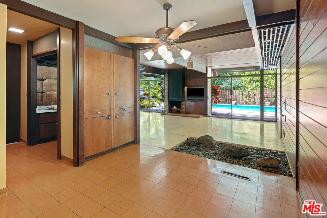 1335 Shadybrook Drive Beverly Hills, CA 90210 - Photo 12 of 39 a view of a hallway kitchen and dining room