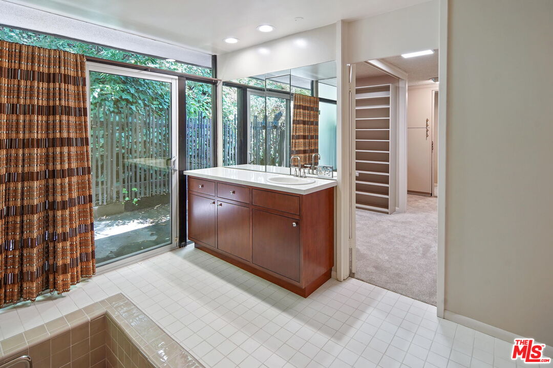 1335 Shadybrook Drive Beverly Hills, CA 90210 - Photo 26 of 39 a view of kitchen with furniture and large window