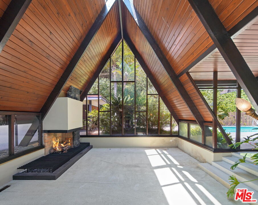 1335 Shadybrook Drive Beverly Hills, CA 90210 - Photo 7 of 39 a view of an outdoor space with a large window