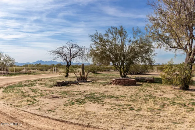 a view of a house with a snow on the road