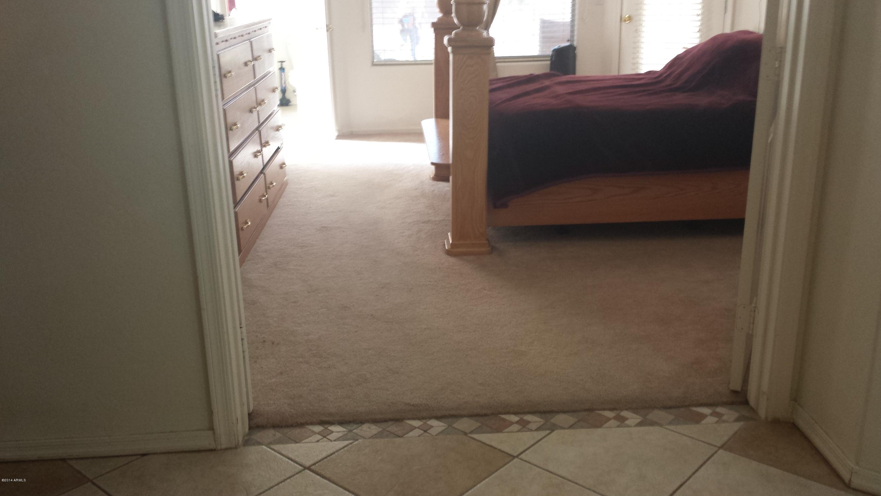 11030 West Granada Road Avondale, AZ 85392 - Photo 23 of 49 Master Bedroom double door entryway