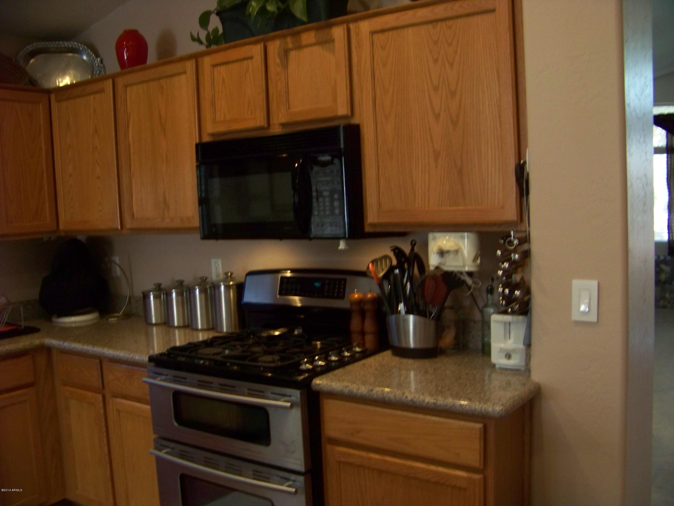 11030 West Granada Road Avondale, AZ 85392 - Photo 9 of 49 Kitchen Built in M/W & Gas range