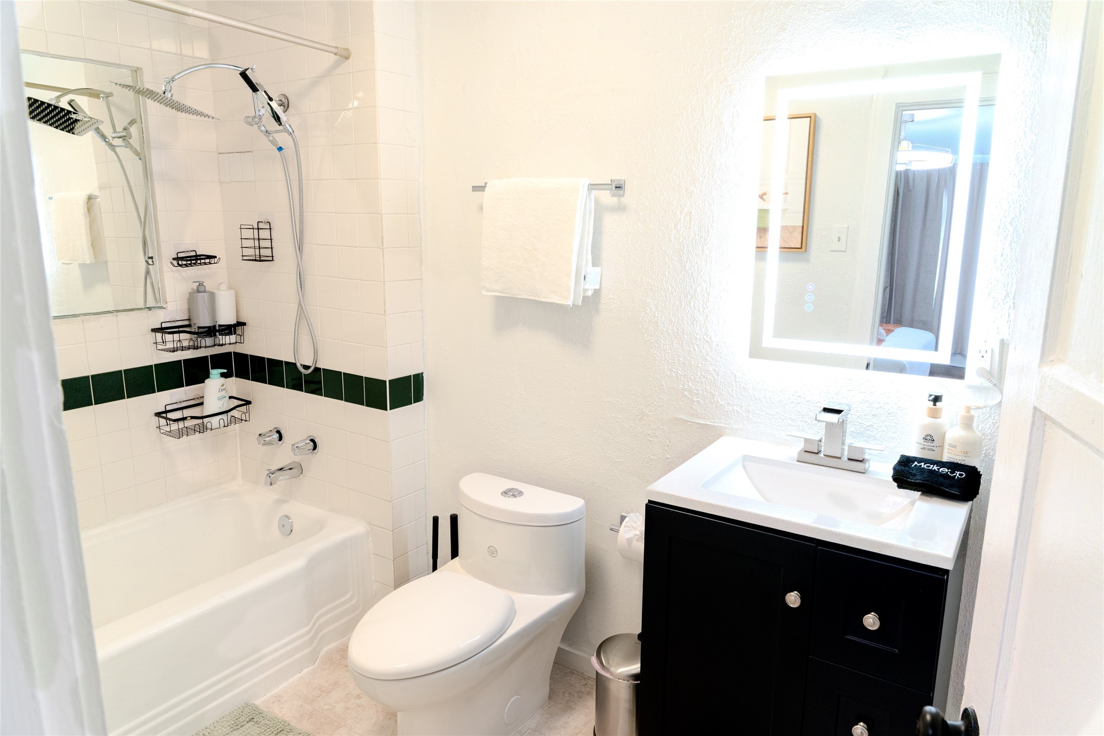 2016 Dunlavy Street, Unit 3 Houston, TX 77006 - Photo 21 of 22 a bathroom with a sink a toilet and shower