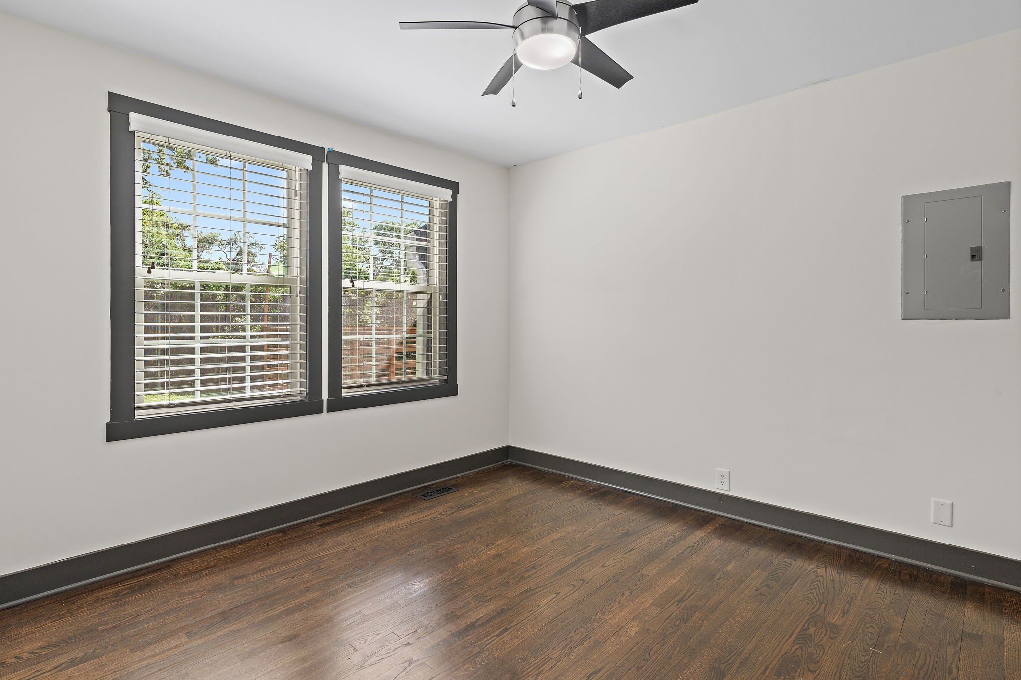 2614 Live Oak Road Nashville, TN 37210 - Photo 19 of 37 a view of an empty room with a window and wooden floor