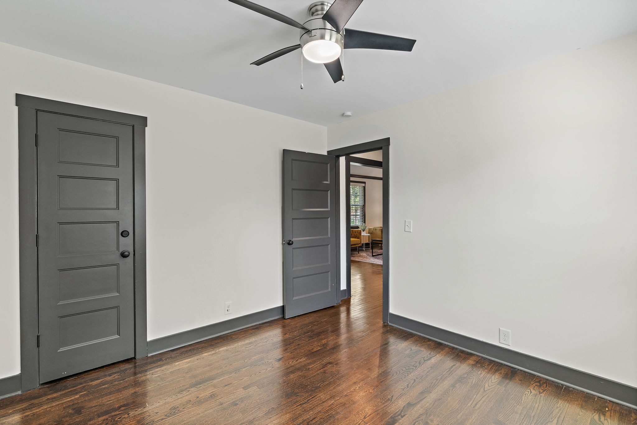 2614 Live Oak Road Nashville, TN 37210 - Photo 21 of 37 an empty room with wooden floor closet and ceiling fan