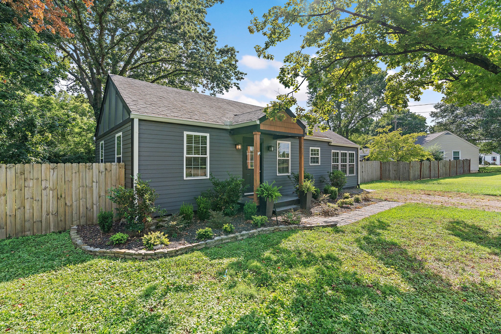 2614 Live Oak Road Nashville, TN 37210 - Photo 4 of 37 a view of a house with backyard sitting area and garden