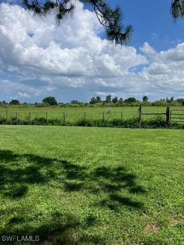 a view of a garden with a houses
