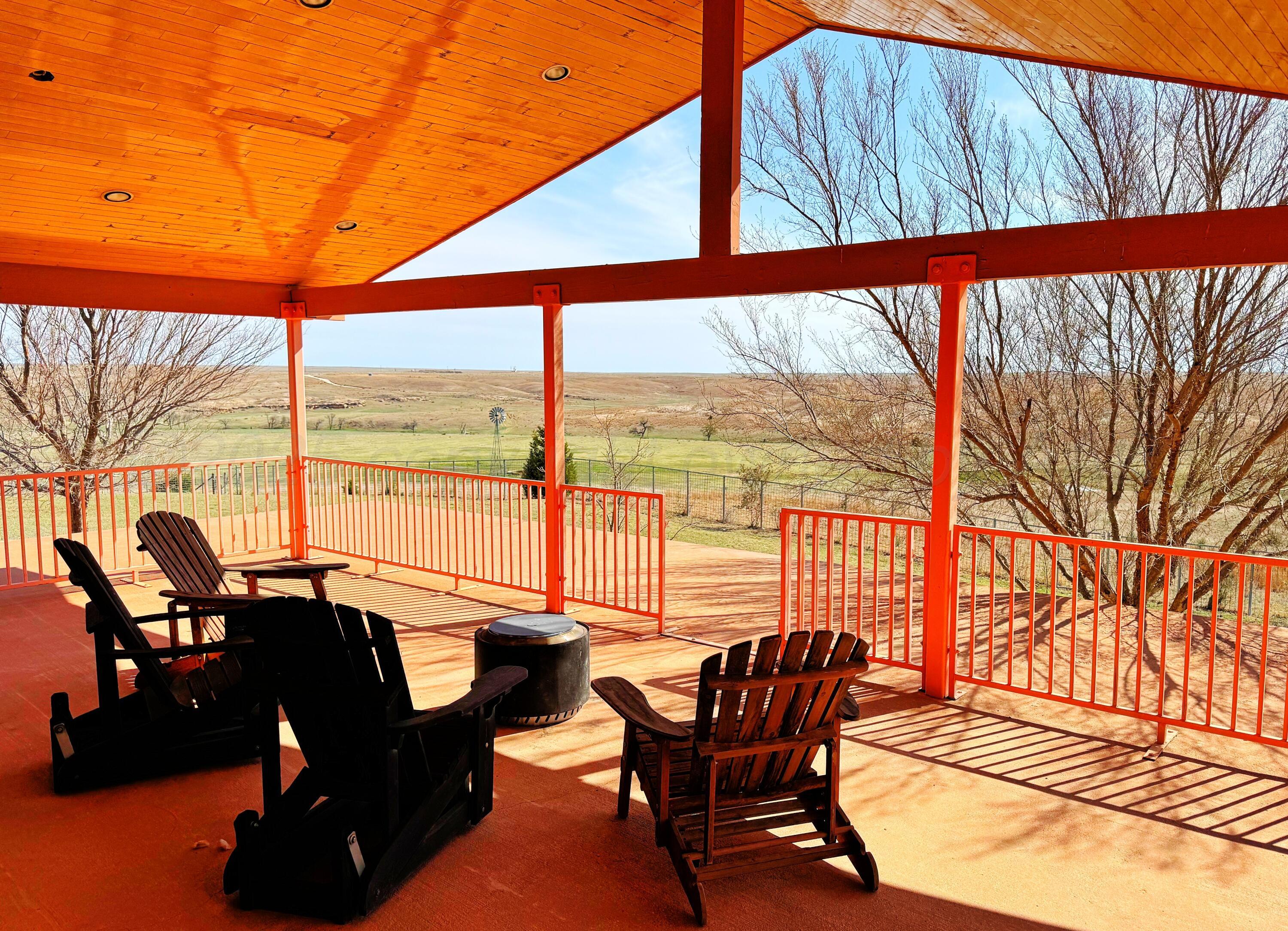 12885 Highway 83 Perryton, TX 79070 - Photo 21 of 40 a living room filled with furniture and floor to ceiling window