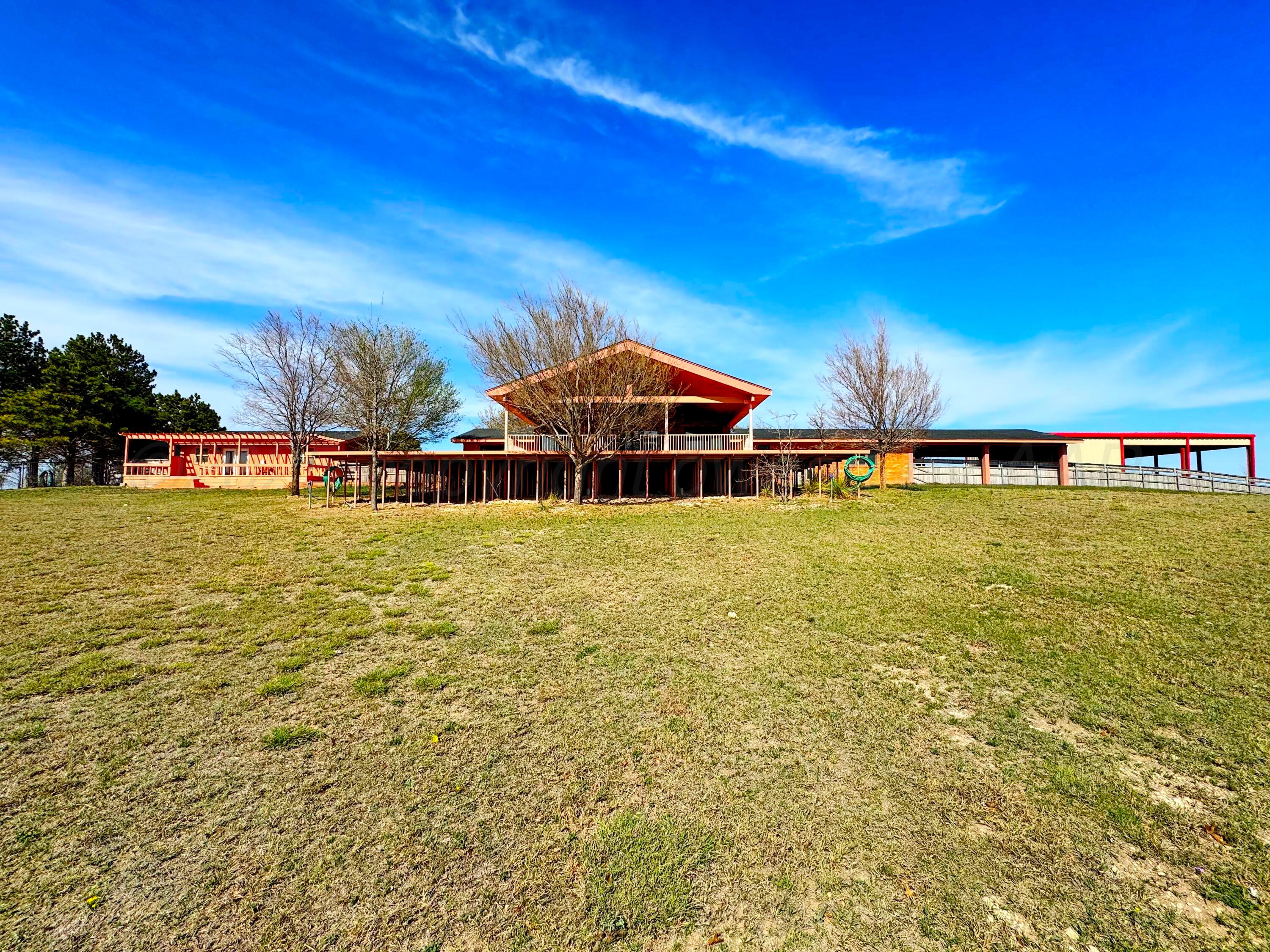 12885 Highway 83 Perryton, TX 79070 - Photo 22 of 40 a view of a swimming pool with an outdoor seating