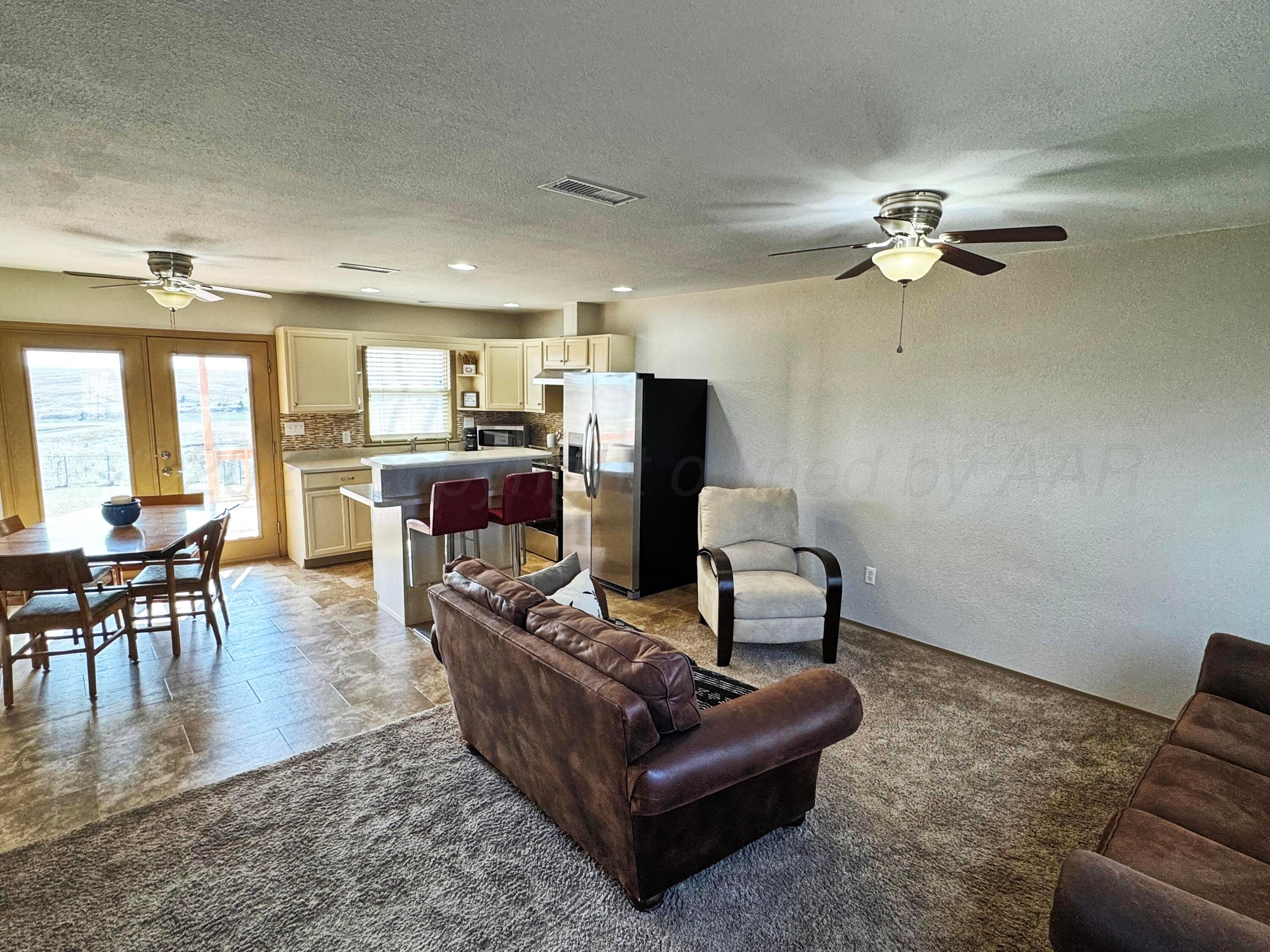 12885 Highway 83 Perryton, TX 79070 - Photo 27 of 40 a living room with furniture