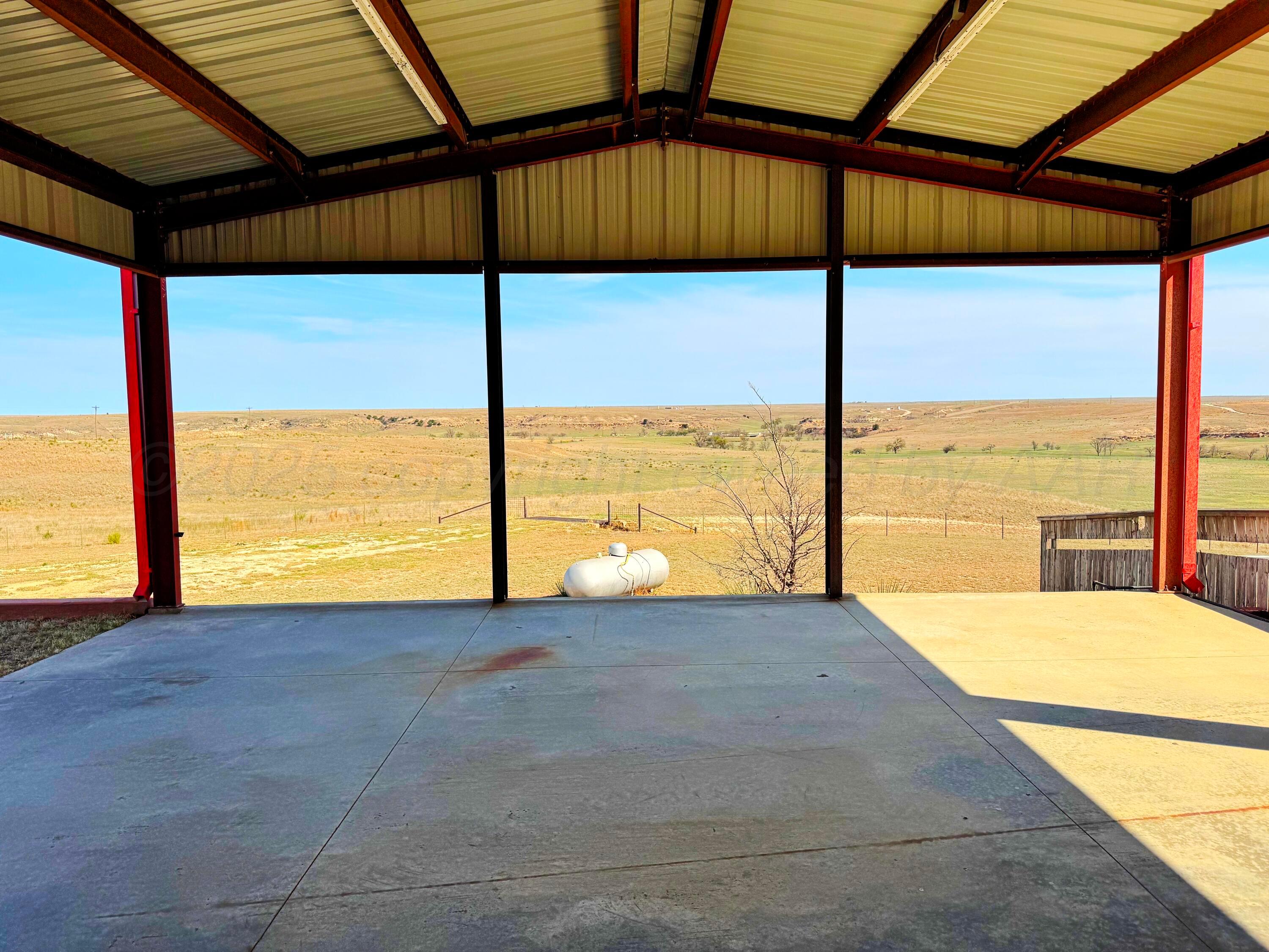 12885 Highway 83 Perryton, TX 79070 - Photo 36 of 40 a view of an empty room with a large window