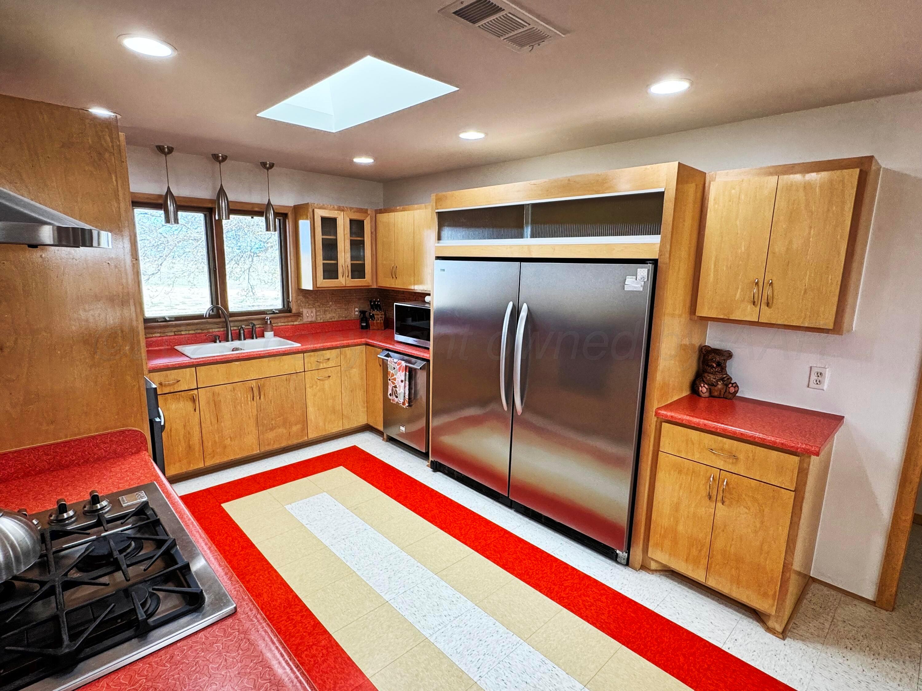 12885 Highway 83 Perryton, TX 79070 - Photo 6 of 40 a room with storage and utility