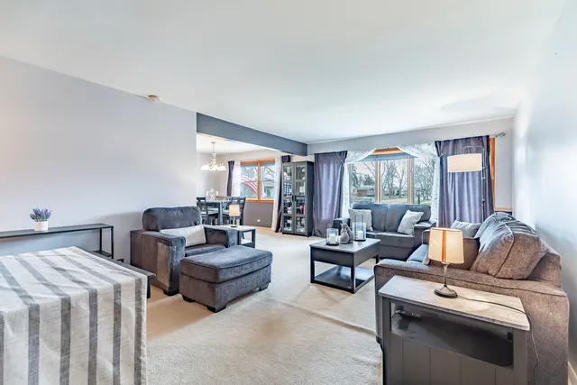 a bathroom with a sink toilet and a mirror