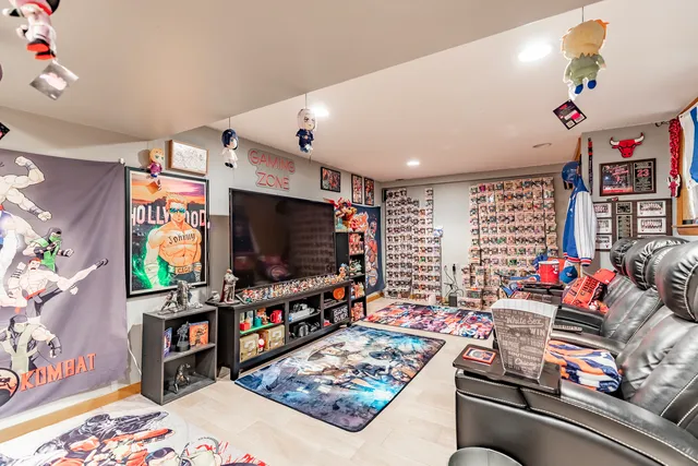 a living room with lots of furniture and a flat screen tv