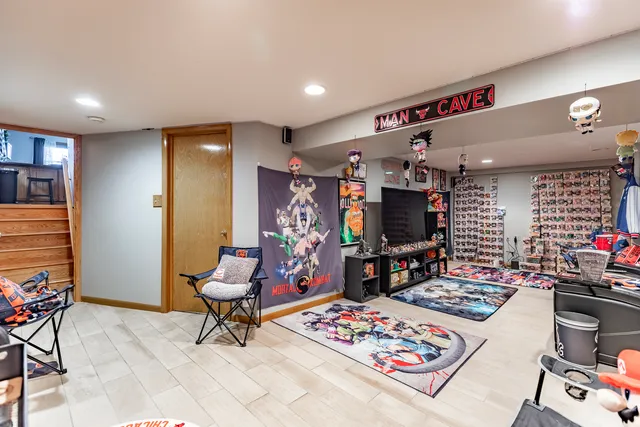 a utility room with a stove and a sink