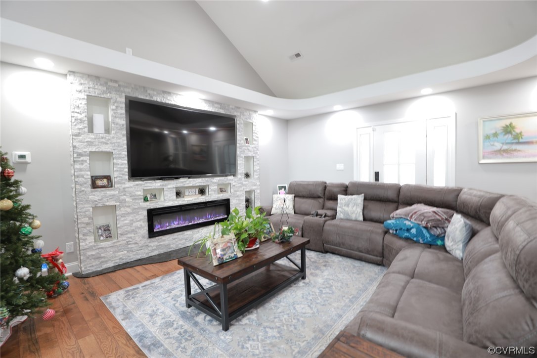 2420 Aberdeen Road Richmond, VA 23237 - Photo 13 of 50 a living room with fireplace furniture and a flat screen tv