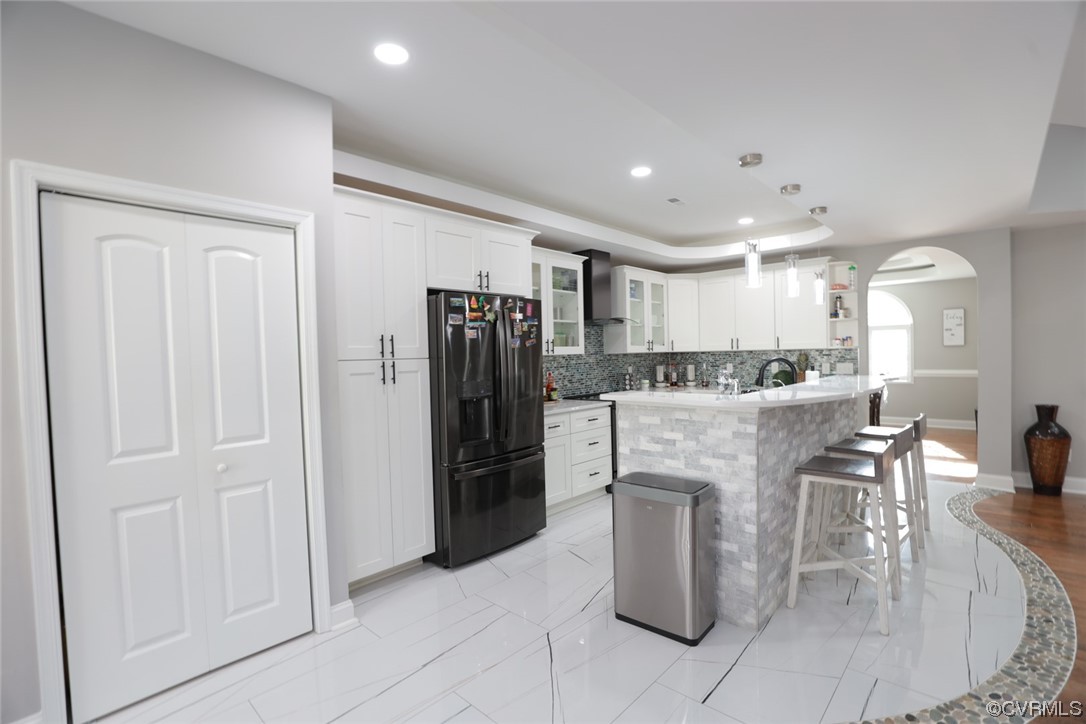 2420 Aberdeen Road Richmond, VA 23237 - Photo 18 of 50 a kitchen with stainless steel appliances kitchen island granite countertop a refrigerator and a sink