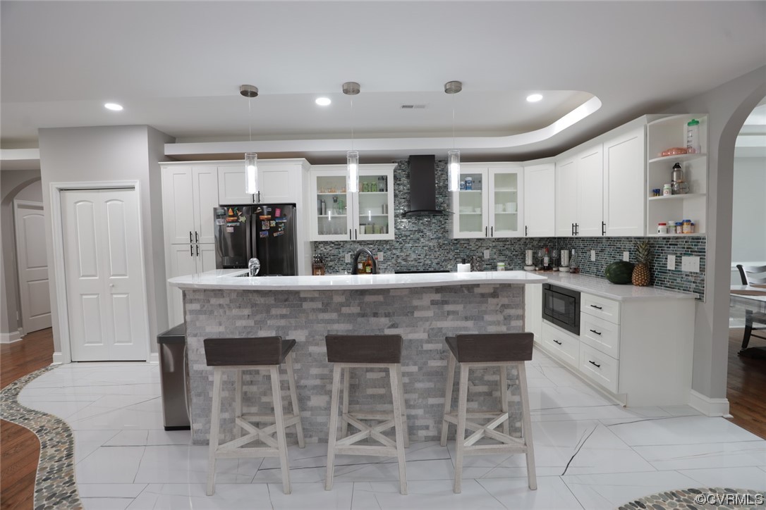2420 Aberdeen Road Richmond, VA 23237 - Photo 22 of 50 a kitchen with granite countertop a stove and white cabinets
