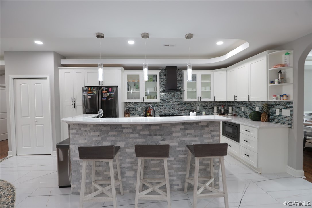 2420 Aberdeen Road Richmond, VA 23237 - Photo 23 of 50 a large white kitchen with chairs and counter space