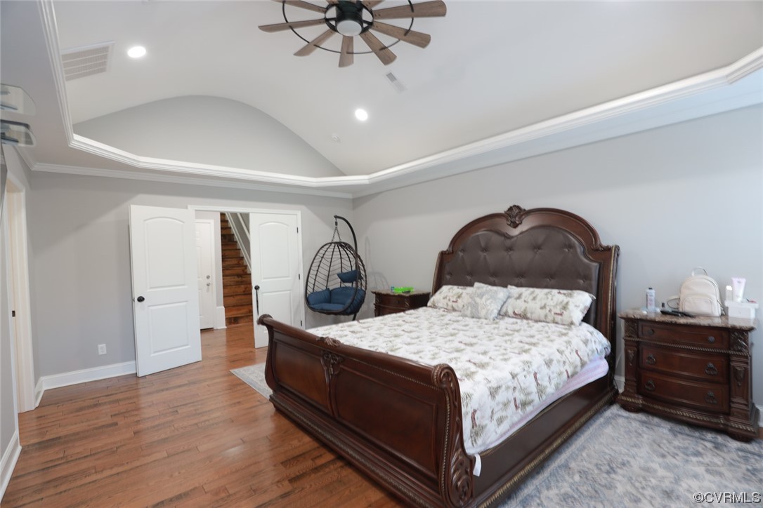 2420 Aberdeen Road Richmond, VA 23237 - Photo 33 of 50 a bedroom with a bed a chandelier and dresser