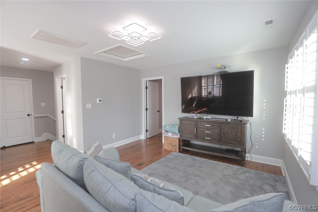 2420 Aberdeen Road Richmond, VA 23237 - Photo 39 of 50 a living room with furniture and a flat screen tv