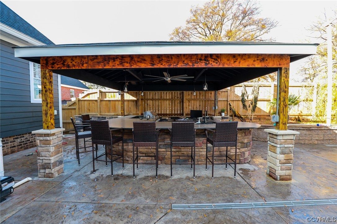 2420 Aberdeen Road Richmond, VA 23237 - Photo 43 of 50 a view of a patio with table and chairs
