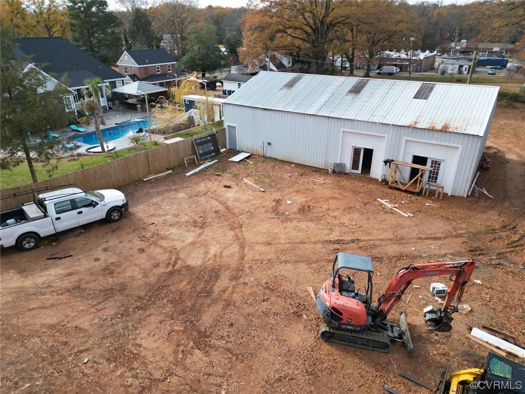 2420 Aberdeen Road Richmond, VA 23237 - Photo 9 of 50 a aerial view of a house with a garden and lawn chairs