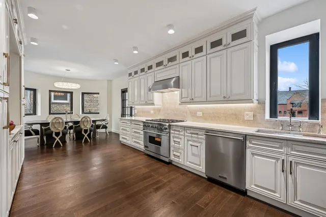 a bedroom with a bed and a fireplace