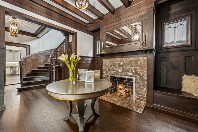 a view of a dining room with furniture wooden floor and chandelier