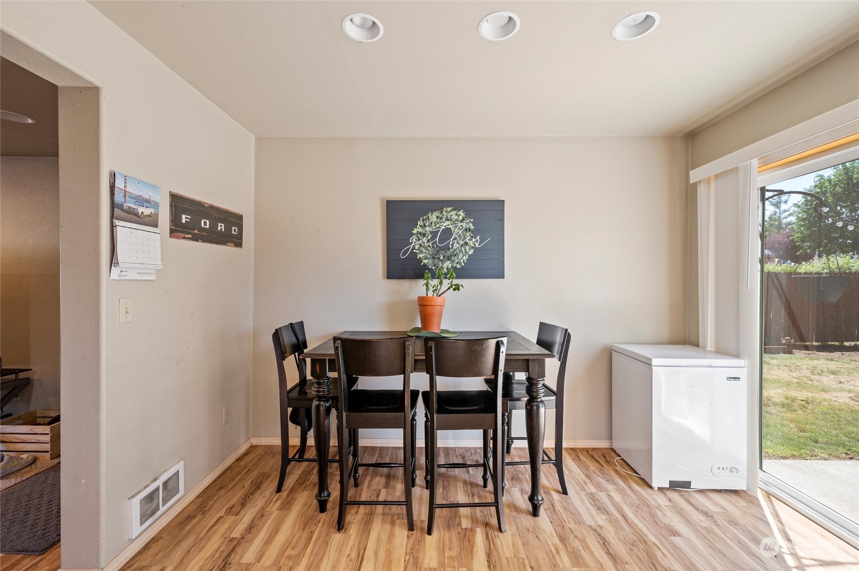 186 East Pole Road Lynden, WA 98264 - Photo 30 of 40 a view of a dining room with furniture and wooden floor