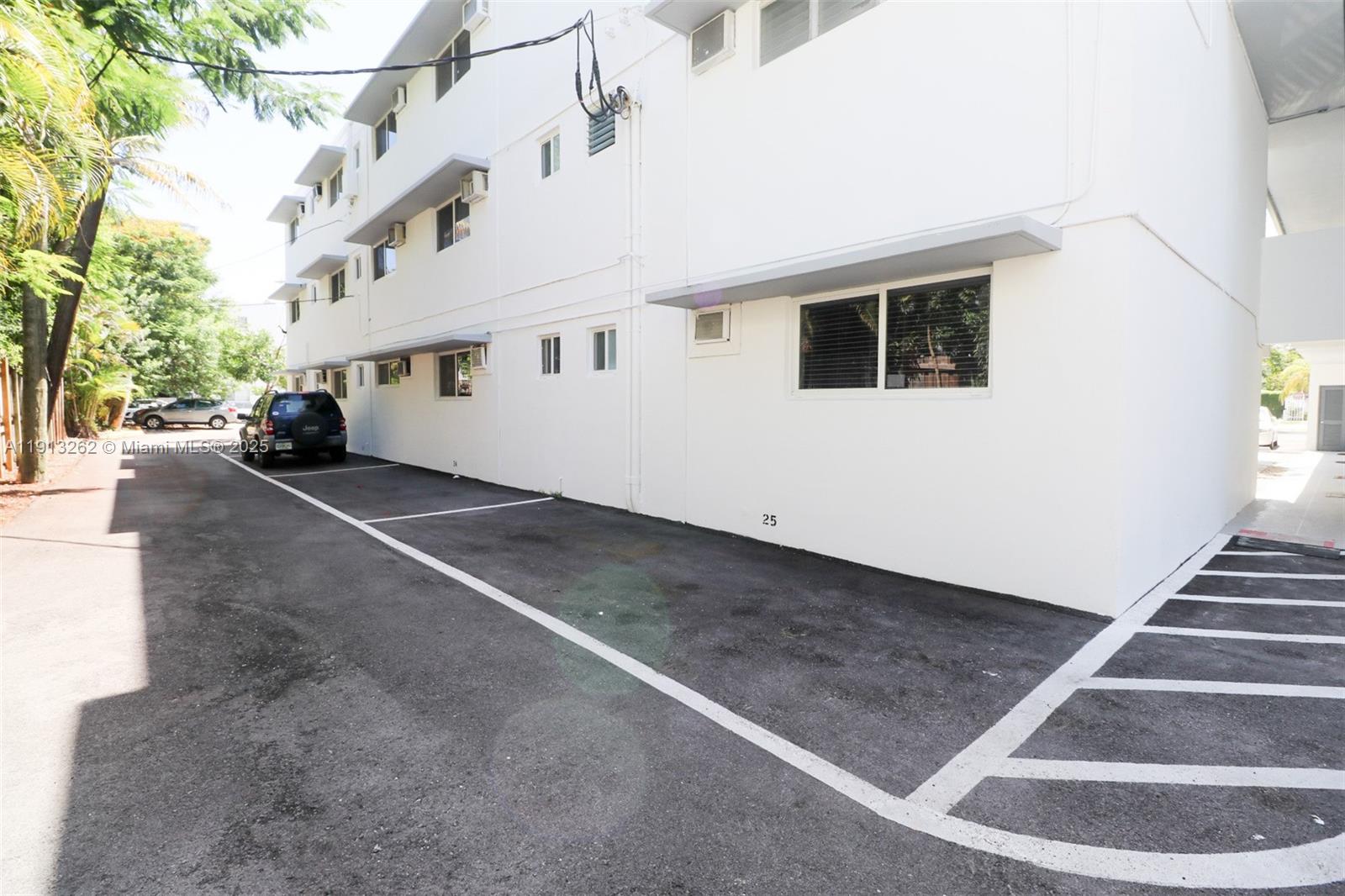 3071 Southwest 27th Avenue, Unit 5 Miami, FL 33133 - Photo 17 of 17 a view of a house with a garage