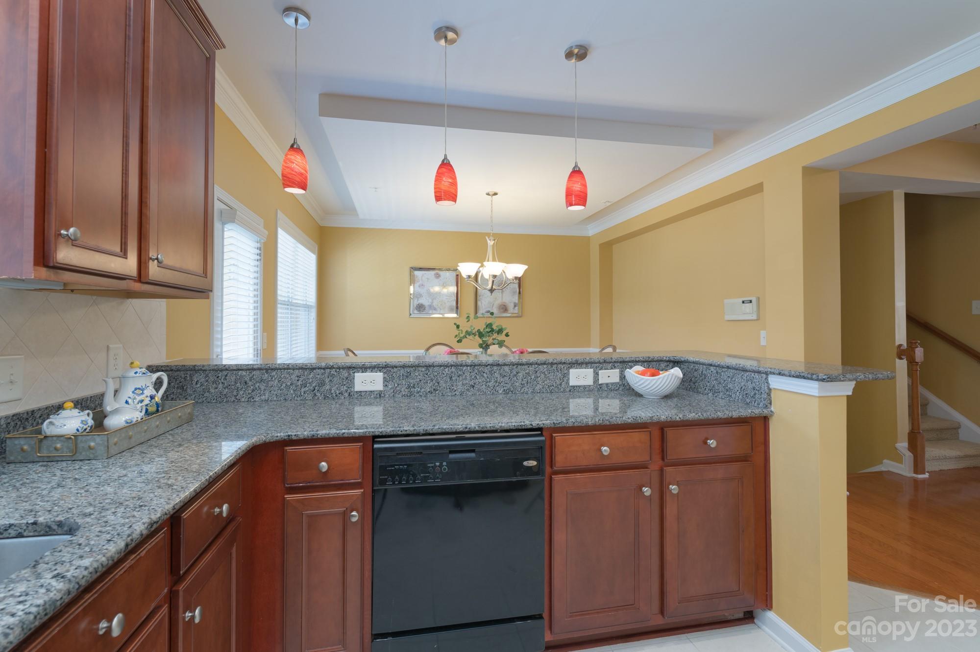 627 Sunfish Lane Tega Cay, SC 29708 - Photo 14 of 46 a kitchen with granite countertop a sink and cabinets