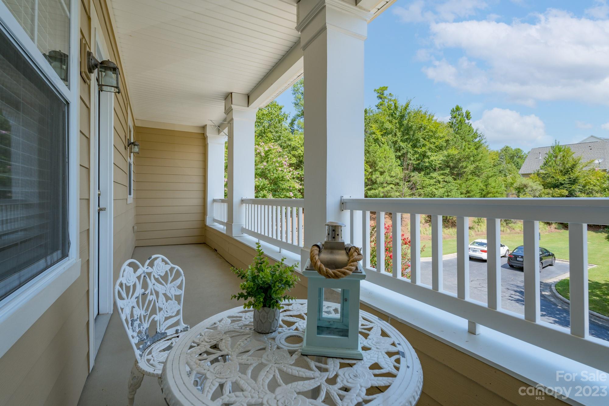627 Sunfish Lane Tega Cay, SC 29708 - Photo 16 of 46 a view of a porch with furniture